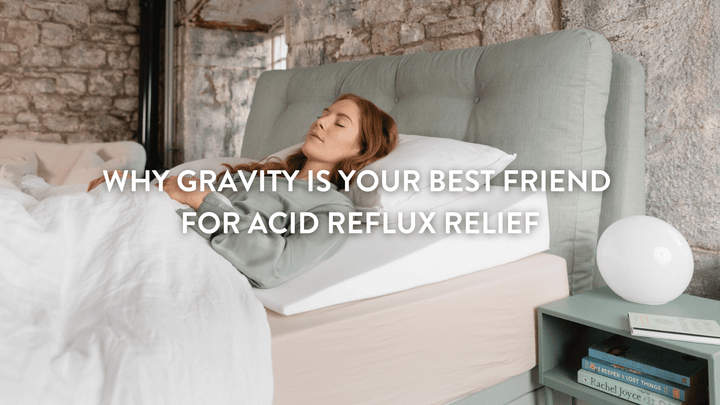 Person lying on a bedwedge.com bed wedge to combat acid reflux 