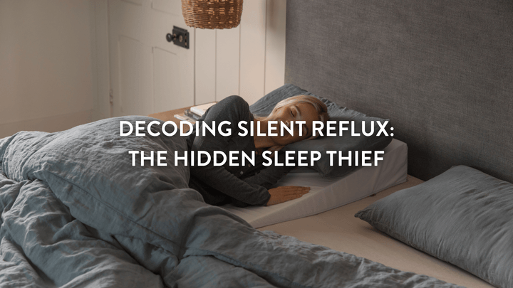 Professional sleeping peacefully using an acid reflux wedge for LPR symptoms